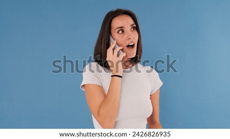 Similar – Image, Stock Photo Surprised woman talking by phone, great news, open mouth, wow. Young lady on pink background. Having smartphone call.