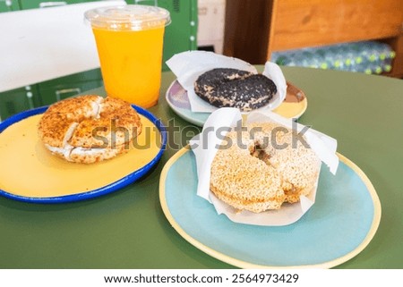 Similar – Image, Stock Photo Different types of fastfood and snacks and glass of beer on the table. Unhealthy and junk food.