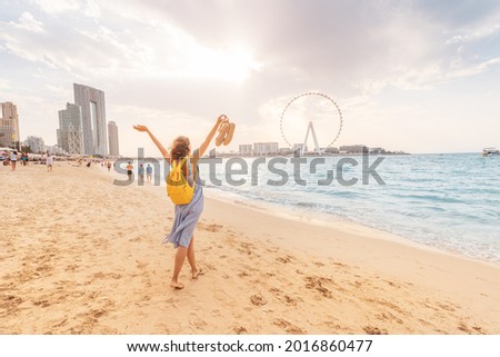 Similar – Image, Stock Photo female traveler admiring a marine view. tourism in Cyprus. tourist on sea background. girl travels on the beaches. young beautiful hipster woman on tropical beach, summer vacation, happy, fun,