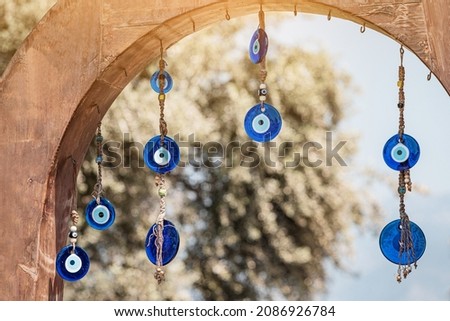 An amulet against the evil eye is a traditional decoration hanging at the entrance to the house. Superstitions and omens in Turkey Foto d'archivio © 