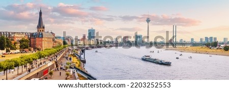 Similar – Foto Bild Blick auf die Düsseldorfer Skyline bei Sonnenuntergang