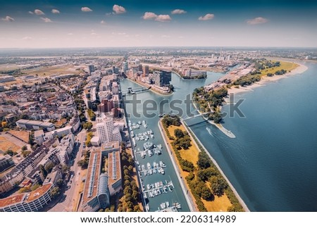 Similar – Image, Stock Photo aerial view of dusseldorf at sunset with the Rheinknie Bridge