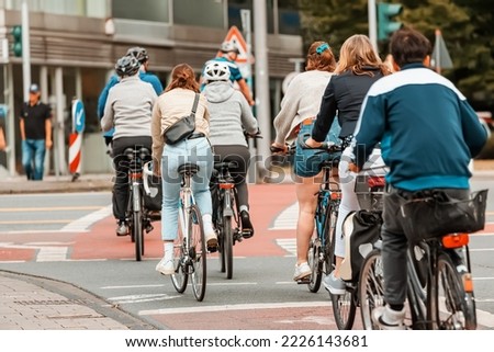 Similar – Image, Stock Photo Bicyclist with light at freezing cold dawn