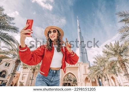 Similar – Image, Stock Photo Girl is taking a sunset photo on the mobile phone