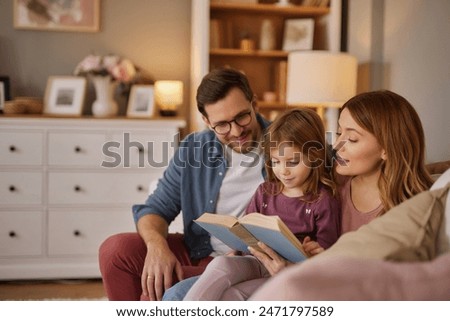 Similar – Image, Stock Photo Child reading on the bed