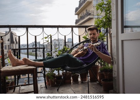 Similar – Image, Stock Photo Relaxed man on balcony with dog