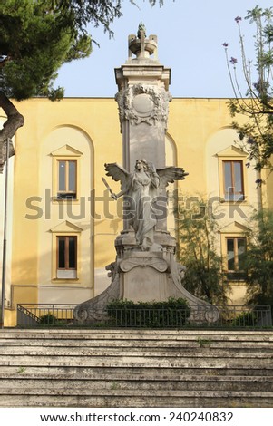 POSSITANO, ITALY - JUNE 24, 2014: War Memorial by sculptor Francesco Calabrese Jerace on Victory square in Possitano, Italy - June 24; Art sculpture opposite Amalfi Coast in old garden