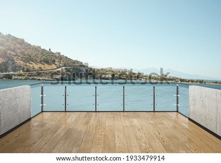View from the balcony to the sea.Landscape. Sunny Day. Terrace with a beautiful view. Background with beautiful landscape. City near the sea. Сток-фото © 