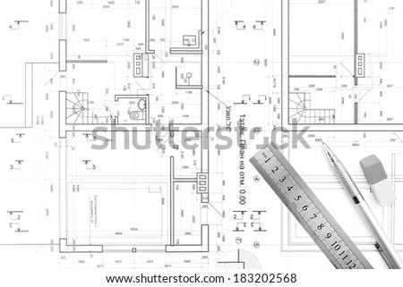 Architectural background with technical drawings and work tools