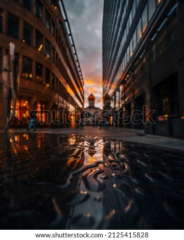 Similar – Image, Stock Photo Reflection of a church tower and houses in the water