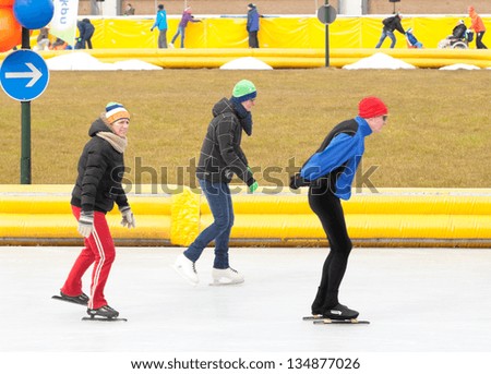 AMSTERDAM - MAR 24: Unidentified city natives participate in the annual KPN Skating Friends Day, organized by the Dutch Foundation for Disability Sport, March 24, 2013, in Amsterdam, The Netherlands