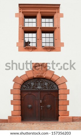 Door and window at the facade of 1907 building in Speyer, Germany