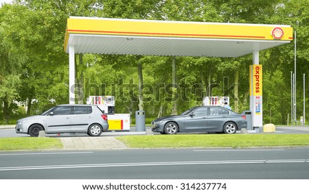 HILVERSUM, THE NETHERLANDS - SEPT 5, 2015: Unmanned Shell express gasoline station. Shell, an Anglo-Dutch multinational oil and gas company, is headquartered in the Netherlands.