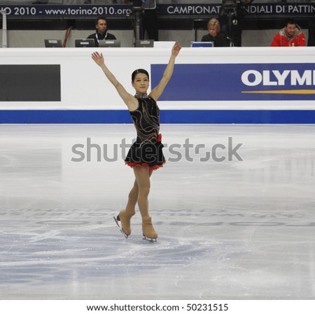 TURIN - MARCH 26: Akiko Suzuki of Japan takes a bow as she finishes her performance at the ISU World Figure Skating Championships held March 26, 2010 in Turin, Italy