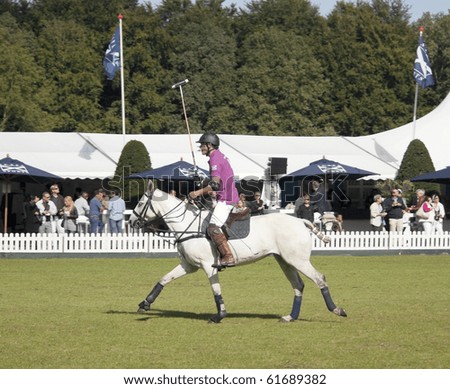AMSTERDAM, THE NETHERLANDS - SEP 25: Professional international polo players participate in the annual Amsterdam Polo Trophy, September 25, 2010 in Amsterdam, The Netherlands