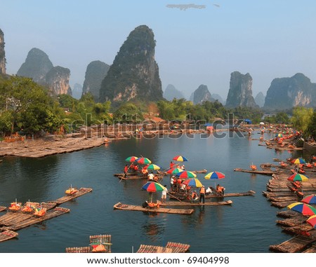 GUILIN, CHINA - OCT 7: Local boatmen gather at Lijiang River\'s banks in anticipation of arrival of thousands tourists, October 7, 2007 in Guilin, China