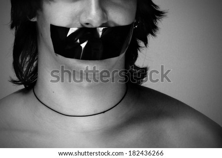 The young man with duct tape over his mouth