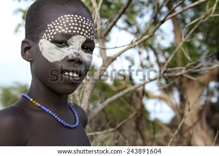 SOUTH OMO - ETHIOPIA - NOVEMBER 25, 2011: Portrait of the unidentified boy from the African tribe Hamer, in November 25, 2011 in Omo Rift Valley, Ethiopia.