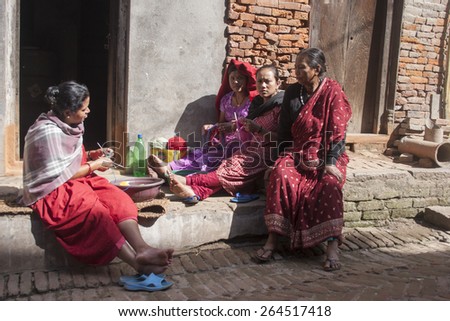 KATHMANDU, NEPAL,  NOVEMBER 06, 2006:  Unidentified women working in the street of Kathmandu, Nepal.
