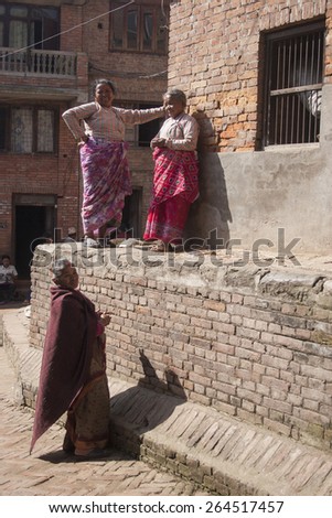 KATHMANDU, NEPAL, NOVEMBER 06, 2006: A group of women in Kathmandu tolking and working in the street of Kathmandu, Nepal