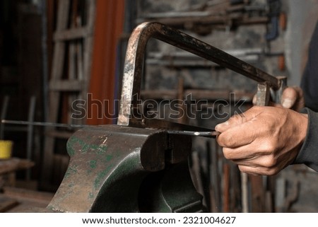 Similar – Image, Stock Photo Blacksmith cutting metal