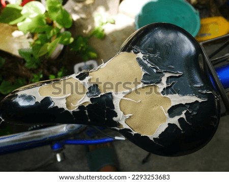 Similar – Image, Stock Photo Old bicycle saddle with visible springs and rust