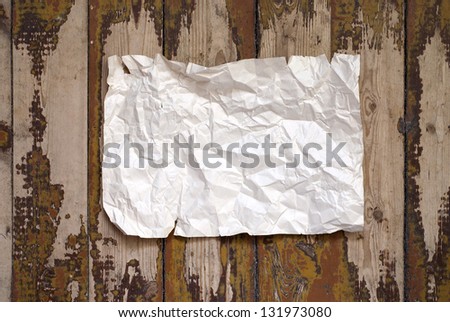 paper on the grunge plank floor background