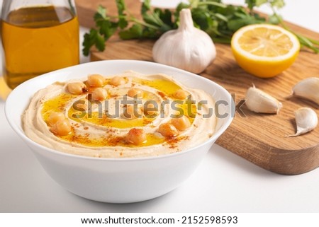 Delicious hummus with chickpeas, olive oil, lemon and pita bread. Vegetarian food concept. Stockfoto © 