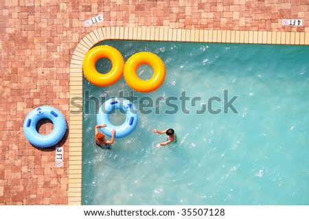 Swimming pool with pool rings/ pool floats