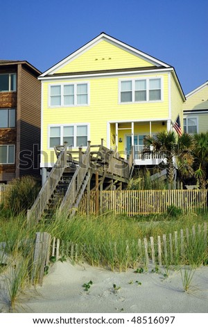 lovely yellow beach rental home