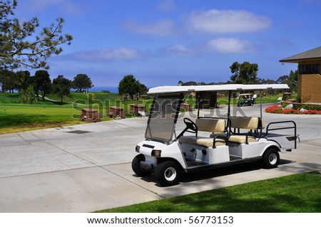 Golf cart waiting for golfers