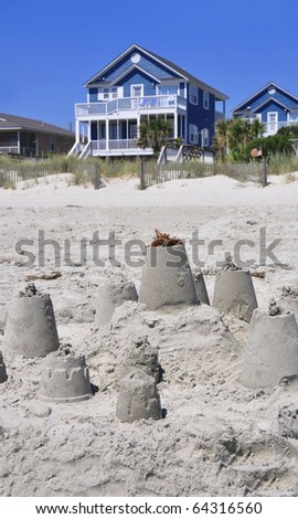 Sand Castle with Beach Rental in background, perfect for cover art