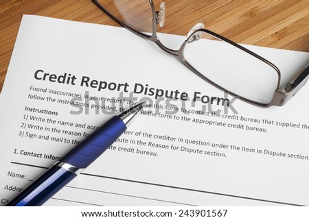 Credit report dispute score on a desk