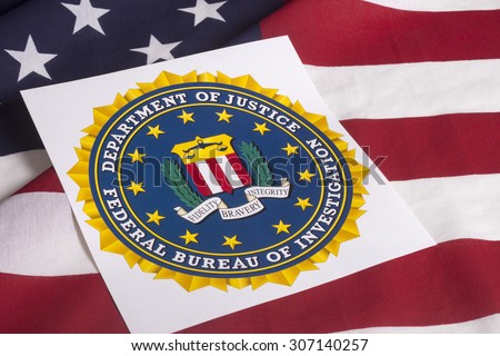 Department of justice Federal bureau of investigation with US flag background