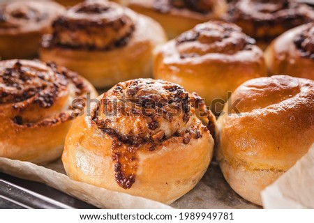 Image, Stock Photo Close-up sweet Scadinavian aromatic cinnamon rolls. Traditional homemade pastry made from butter dough. Delicious buns on baking paper. Winter christmas Scandinavian pastries.