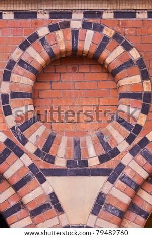Ornate brickwork detail from a Victorian grain store in Bristol UK