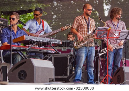 BRISTOL, ENGLAND - JULY 31: The Pete Josef band play the Queen Square stage at the Harbour Festival in Bristol, England on July 31, 2011. The event played host to a record 280,000 spectators