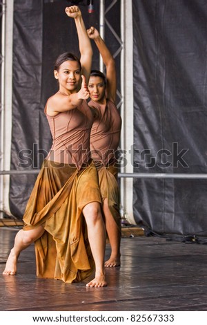 BRISTOL, ENGLAND - JULY 30: Classical Indian dance performed by Atma in the Dance Village at the Harbour Festival in Bristol, England on July 30, 2011. The event attracted a record 280,000 spectators