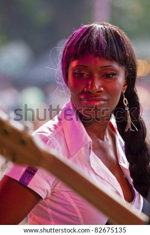 BRISTOL, ENGLAND - JULY 30: Singer Celestine performing with her band on the Queen Square stage at the Harbour Festival in Bristol, England on July 30, 2011. 280,000 people attended the weekend event