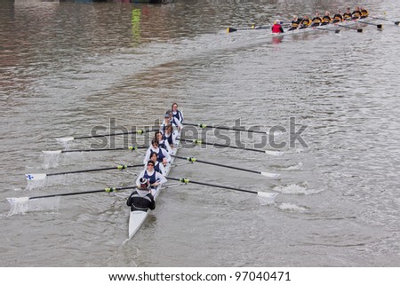 BRISTOL, ENGLAND - FEBRUARY 19: Crew from the Bristol Ariel Rowing Club in pursuit of a rival team in the annual Head of the River race in Bristol, England on February 19, 2012. 100 teams entered.
