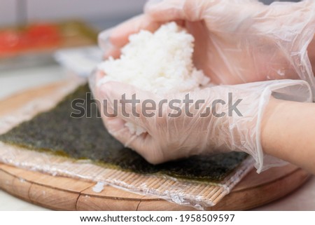 Similar – Image, Stock Photo Crop chef preparing sushi at table in restaurant