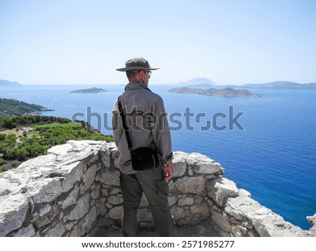 Similar – Image, Stock Photo Tourists gazing at breathtaking snowy mountain slope