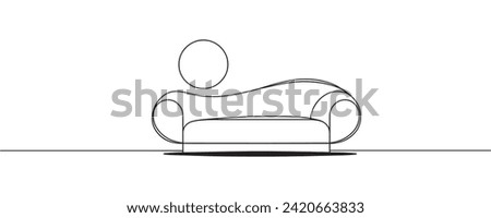 Continuous drawing of a sofa, front view. Modern sofa in one continuous line.