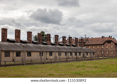 OSWIECIM, POLAND - AUGUST 15: Buildings barbed wire fence the Auschwitz I, a former extermination camp on August 15, 2012 in Oswiecim, Poland. It was the biggest nazi concentration camp in Europe