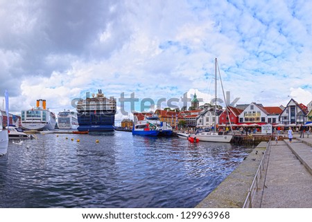STAVANGER, NORWAY-JULY 11: Three luxury cruise ships moored in the port of Stavanger. Costa Marina is 174m long, Mein Schiff 2 is 264m long,Crown Princess is 290 long.July 11, 2011 in Stavanger,Norway