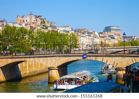 PARIS, FRANCE - MAY 19: The charming streets of Montmartre hill are full of art galleries, cafes and shops to walk about. It\'s one of the most visited landmarks in Paris. May 19, 2010 in Paris, France