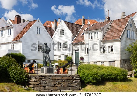 STAVANGER, NORWAY - JULY 23: View to the traditional Norwegian white wooden houses, on July 23, 2015 in Stavanger, Norway. Stavanger is one of most famous travel destinations in Europe.