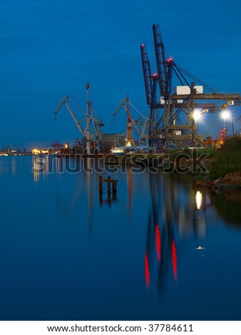 Container quay at night in port of Gdynia, Poland.