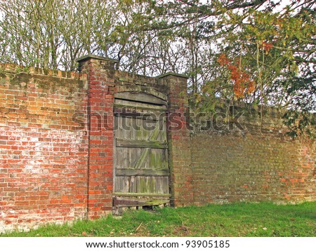 Old gate in old wall to garden