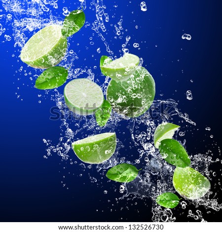 Limes in water splash